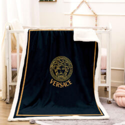 Brown and black Versace blanket