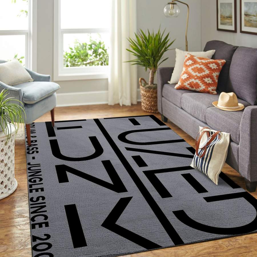 Deschea Idols Area Rug